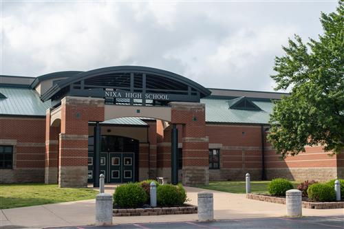 Picture of the front of Nixa High School